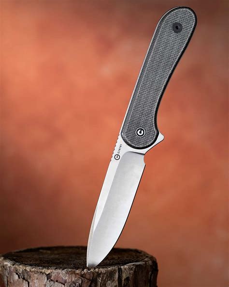 This model of the <strong>CIVIVI</strong> Praxis comes with a black micarta handle and a black blade. . Civivi knives review